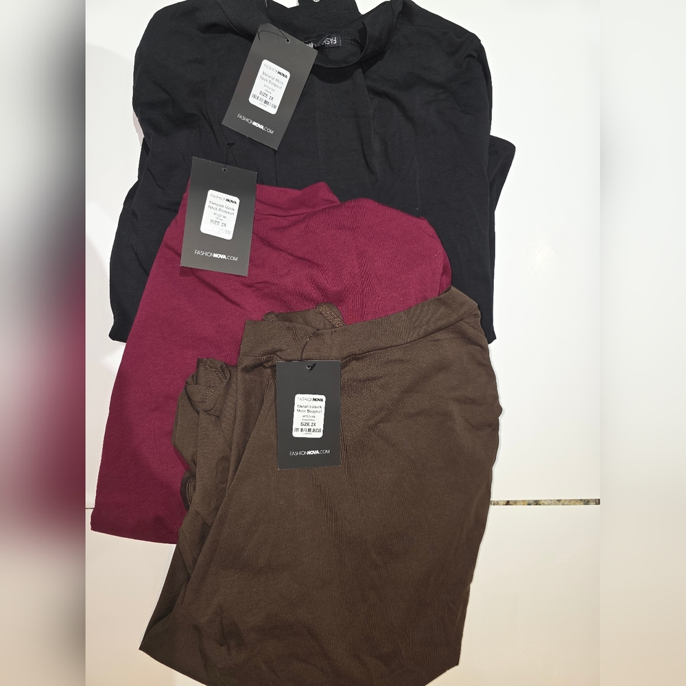 Fashon Nova Black, Burgundy, and Brown Body Suits.